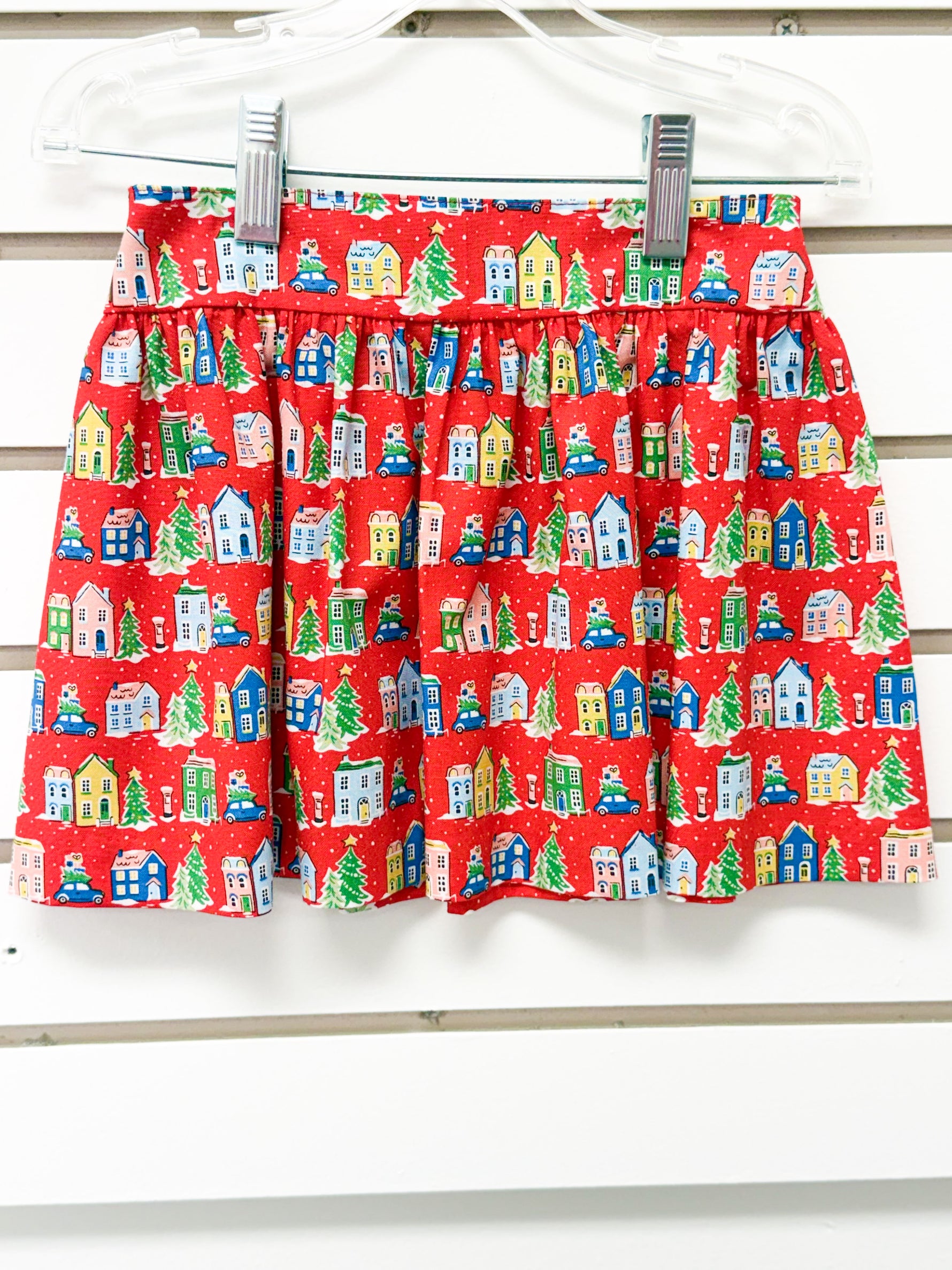 Red Christmas village print gathered skirt with houses, trees, and cars, size 3