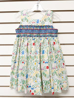 Girl's white sleeveless dress, colorful town print, blue smocked waist, size 3