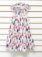 White toddler halter dress with red and navy sailboat print, flutter neckline, size 3