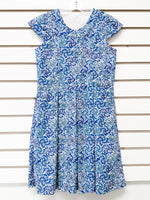 Girl's blue and white swirl print sleeveless dress with pleated skirt, size 8