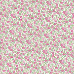 White cotton fabric with pink floral and green leaf allover print pattern