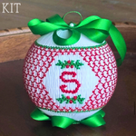 Smocked white Christmas ball ornament with red S monogram and green ribbon bow