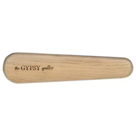 Large wooden clapper tool by The Gypsy Quilter with smooth rounded edges