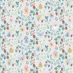 Light blue fabric with fairies, strawberries, flowers, and green vines allover pattern