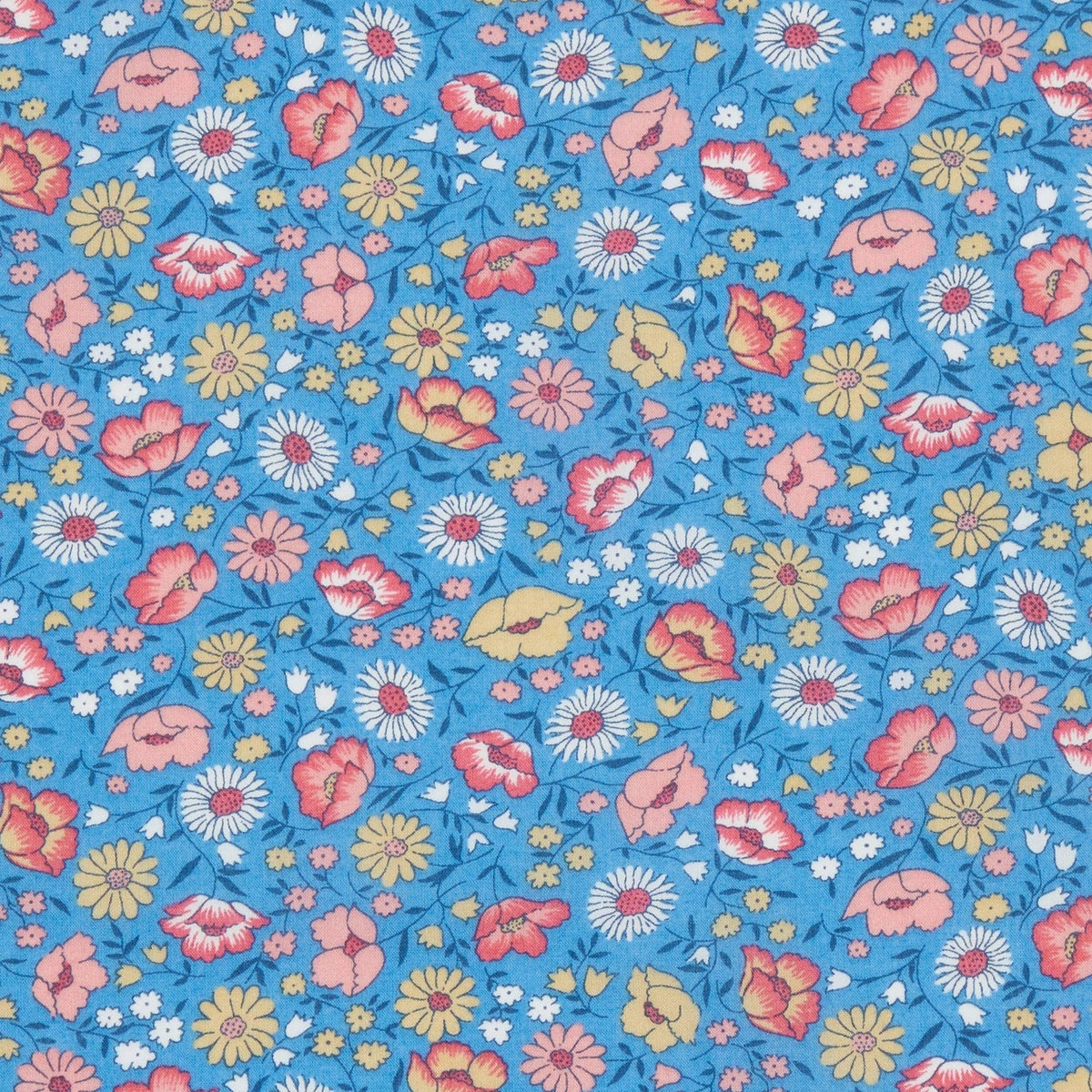 Blue cotton fabric with scattered pink, yellow, and white floral ditsy print pattern