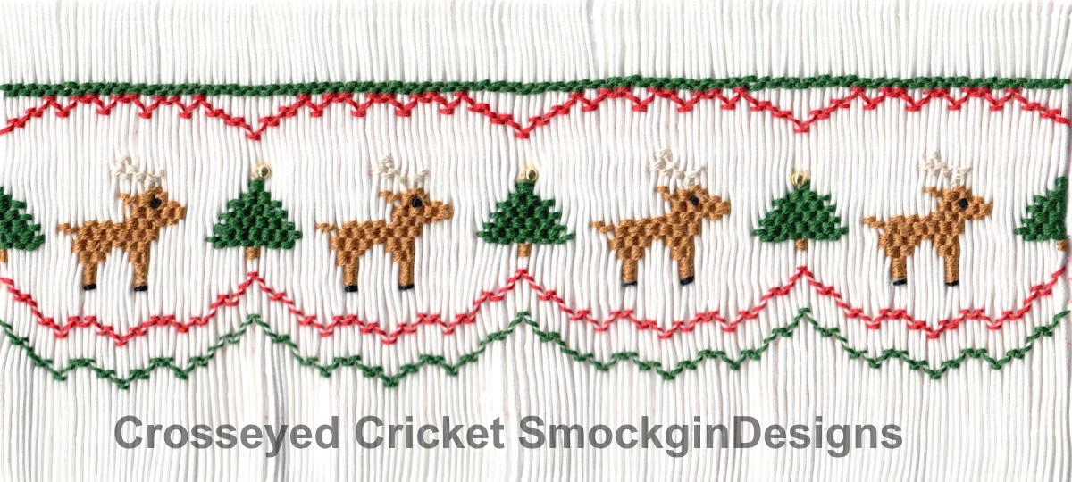 Smocked white fabric with reindeer, Christmas trees, red and green zigzag stitching pattern.