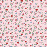Pink cotton fabric with scattered red, pink, and blue ditsy floral print and green leaves