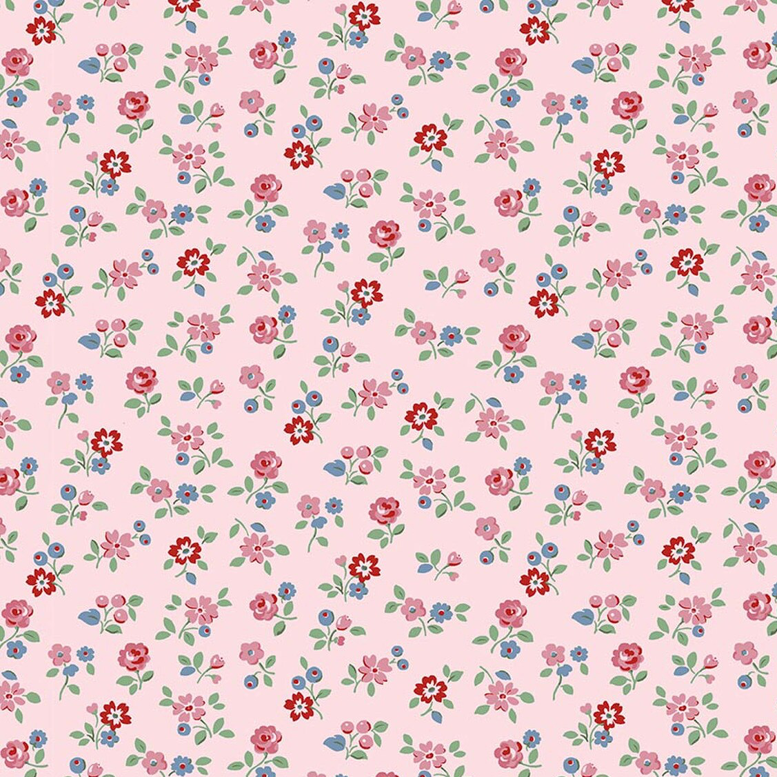 Pink cotton fabric with scattered red, pink, and blue ditsy floral print and green leaves