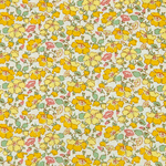 Yellow floral poplin fabric with pink and green flowers on a cream background