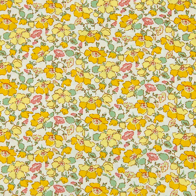 Yellow floral poplin fabric with pink and green flowers on a cream background