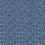 Blue fabric with scattered mini American flags and white dots allover pattern