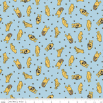 Light blue cotton fabric with scattered yellow Winnie the Pooh and honey pot illustrations