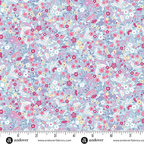 Light blue quilting fabric with dense pink, white, and magenta floral ditsy print pattern.