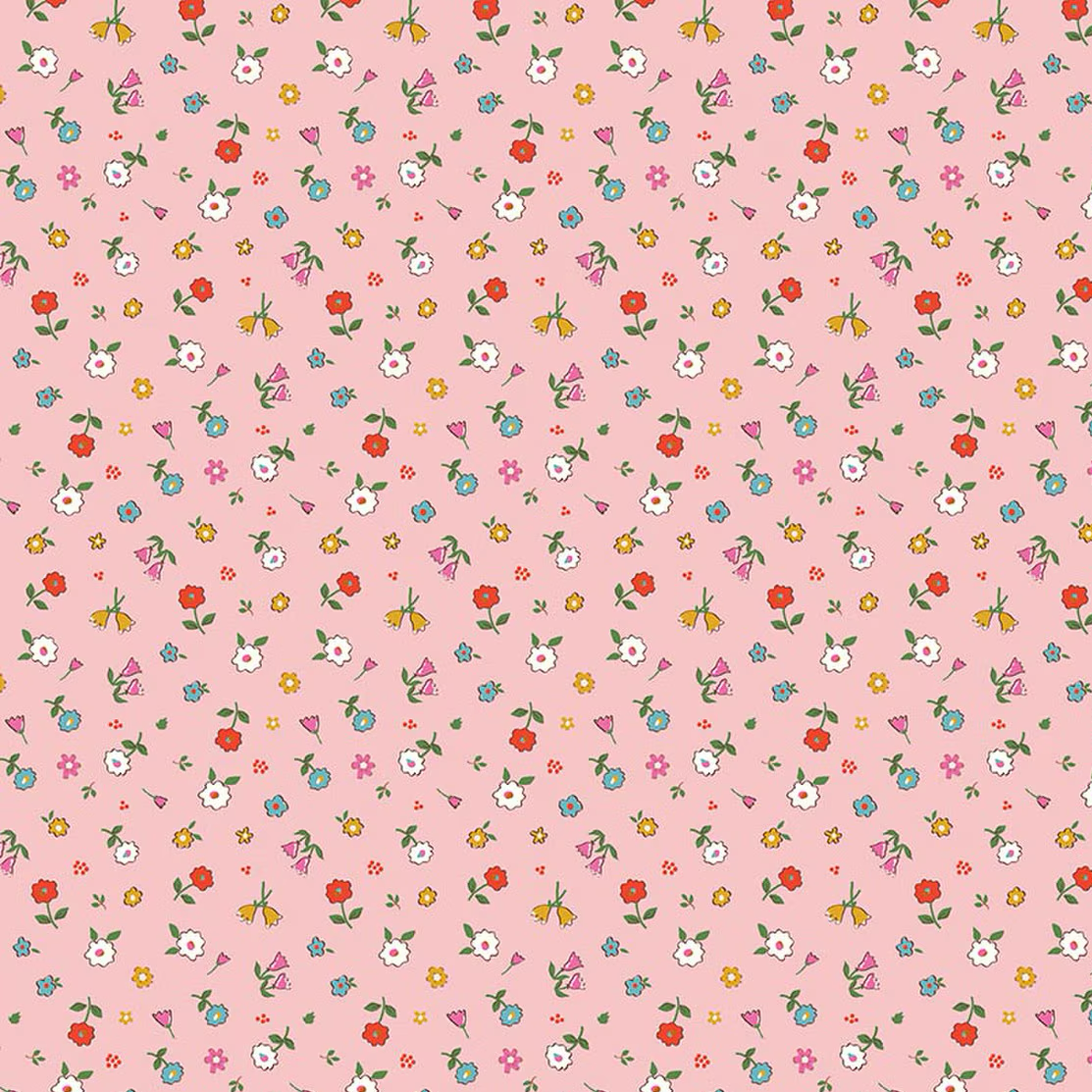 Pink cotton fabric with scattered multicolor small floral ditsy print pattern