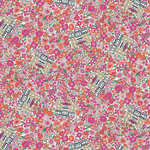 Liberty of London floral fabric with pink orange blooms and illustrated Tudor building motifs