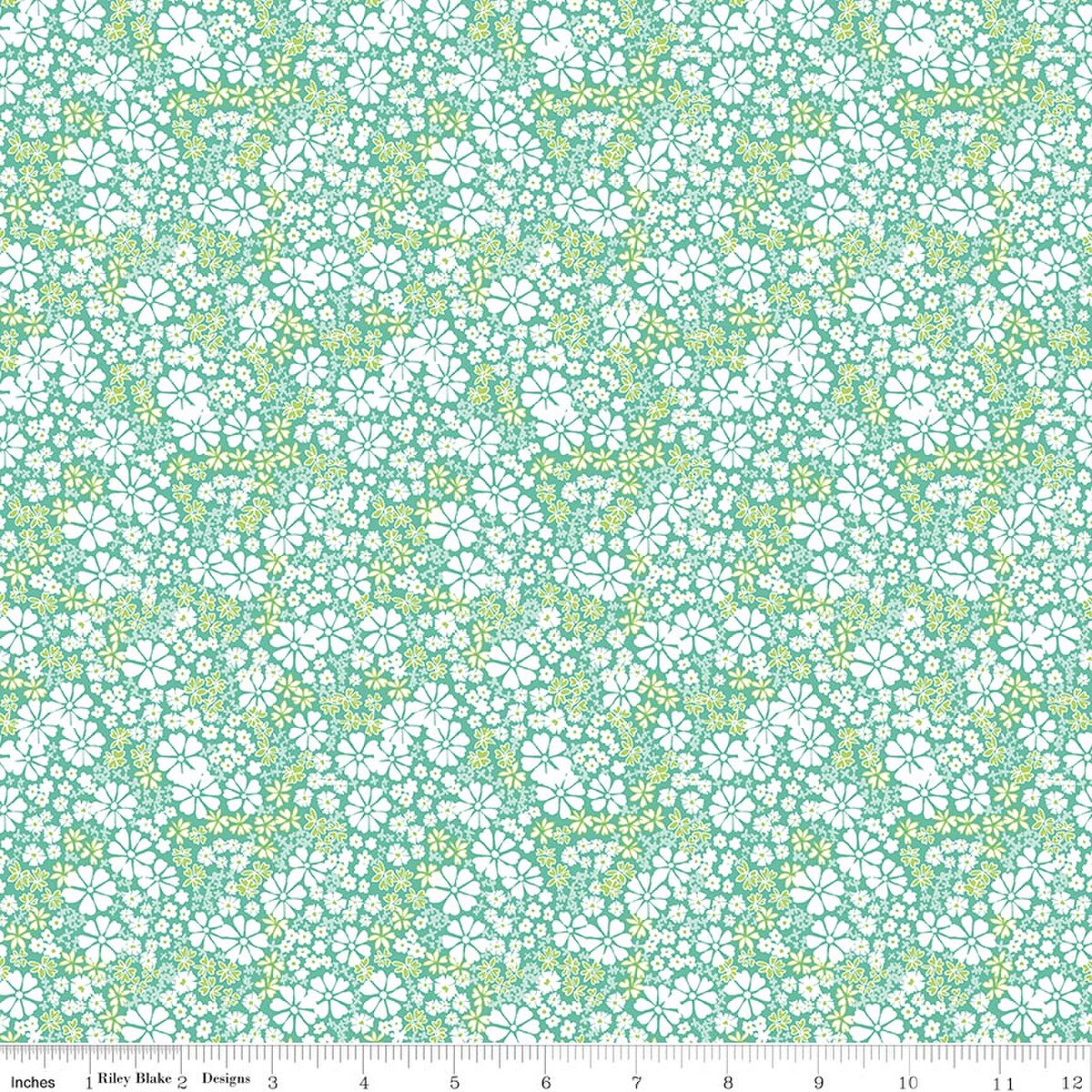 Teal cotton fabric with dense white and yellow floral print pattern