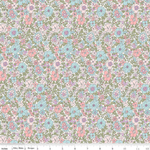 White cotton fabric with pink, blue, and lavender floral ditsy print by Riley Blake