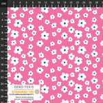Pink knit fabric with white daisy blossoms and blue centers, shown with ruler