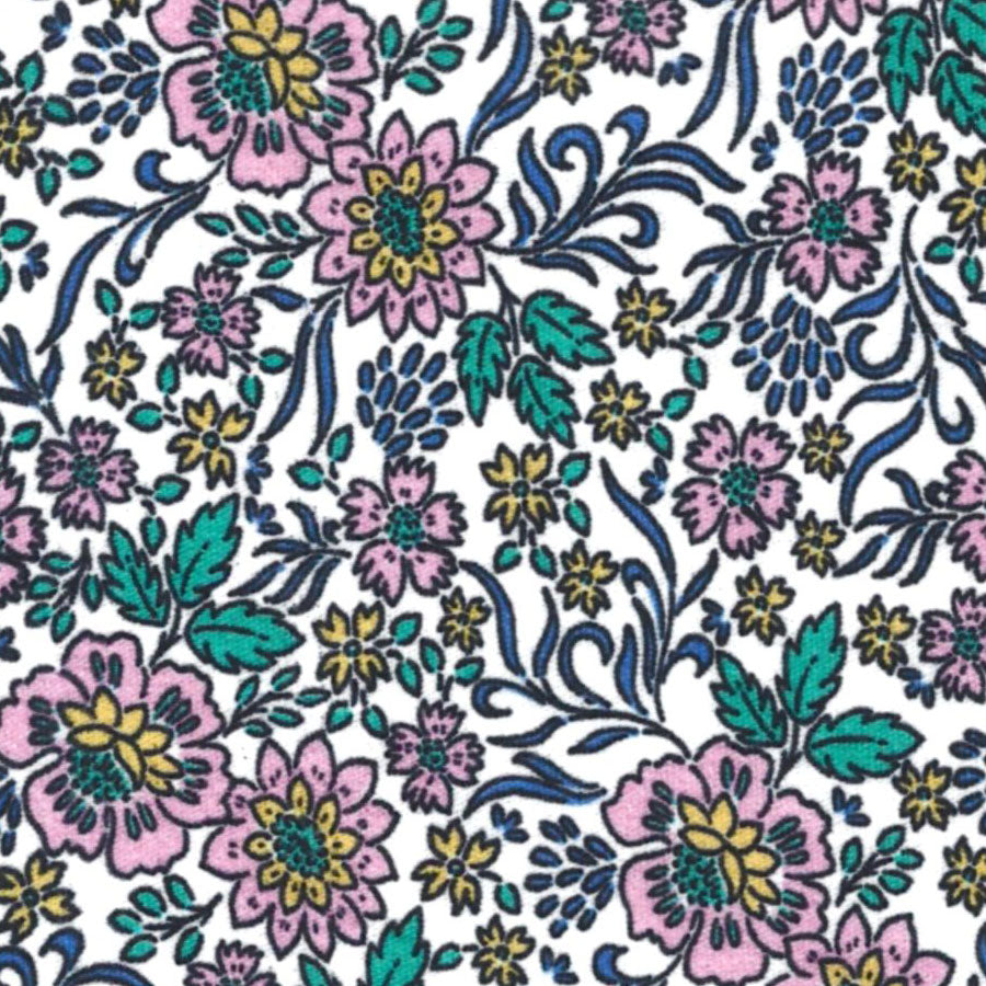 White cotton fabric with pink florals, teal leaves, and navy blue scrolling vines pattern