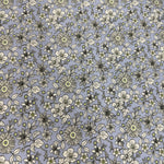Periwinkle blue fabric with cream floral sketch print and green accent centers