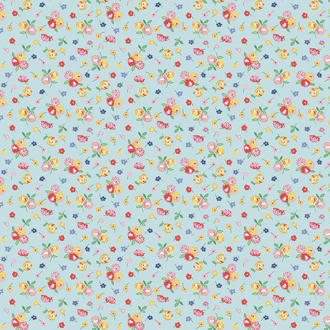 Light blue cotton fabric with scattered multicolor ditsy floral print in red, yellow, and pink