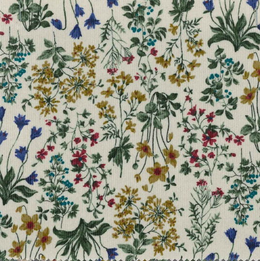 Cream corduroy fabric with multicolor wildflower botanical print in blue, pink, gold, green