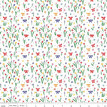 White quilting fabric with colorful tulips, spring flowers, and ribbon bows scattered pattern