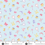 Light blue fabric with scattered butterflies, tiaras, magic wands, moons, and bows in pink and yellow