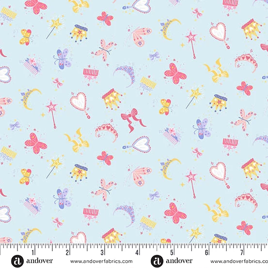 Light blue fabric with scattered butterflies, tiaras, magic wands, moons, and bows in pink and yellow