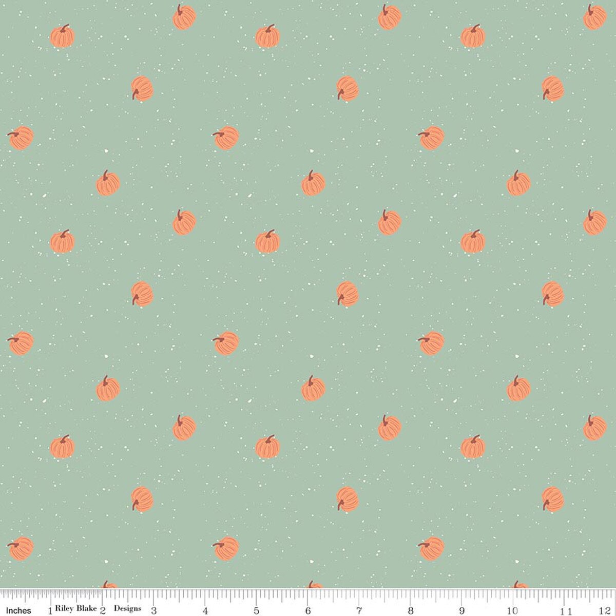 Mint green fabric with scattered small orange pumpkins and white speckles, autumn pattern