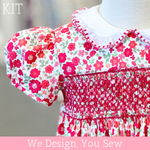 Red floral smocked girls dress kit with puff sleeves and embroidered collar