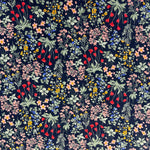 Navy corduroy fabric with dense multicolor wildflower print in pink, red, yellow, and blue