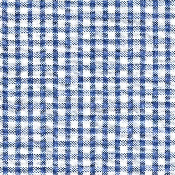 Royal blue and white gingham check seersucker cotton fabric close-up