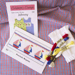 Red and blue gingham check fabric with smocking pattern kit and embroidery floss