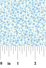 White cotton fabric with scattered small blue floral print and green accents