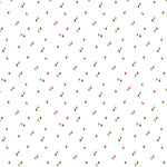 White quilting fabric with scattered small red and green Christmas trees pattern