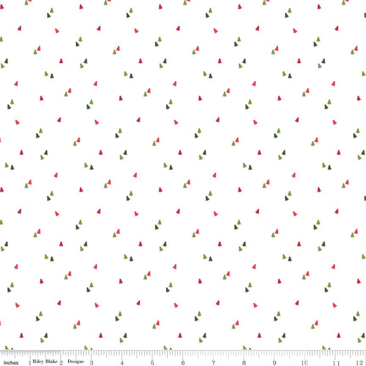 White quilting fabric with scattered small red and green Christmas trees pattern