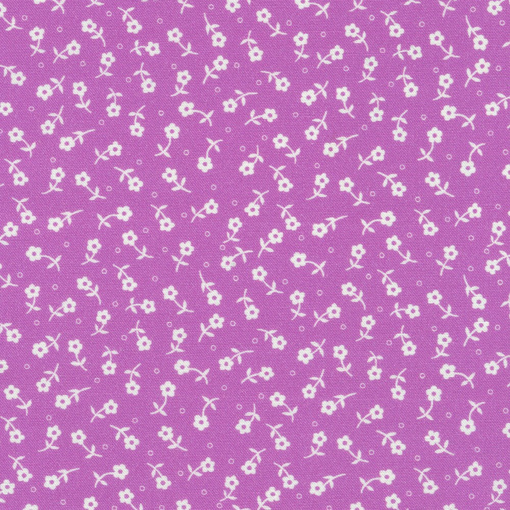 Purple cotton fabric with scattered white ditsy flowers and delicate stems pattern