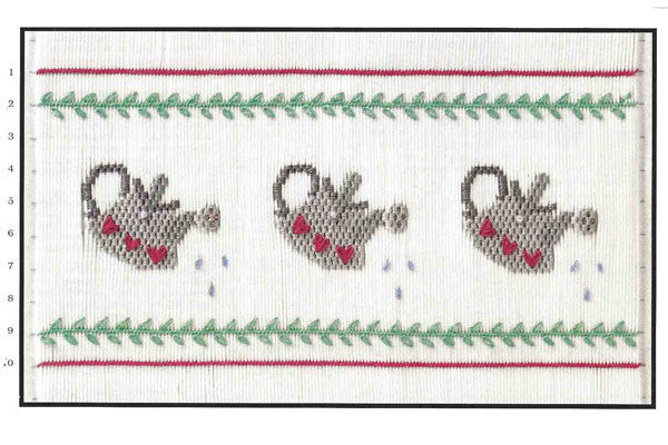 Smocking plate featuring three gray watering cans with red hearts, green leaf borders, red rows