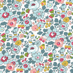 Liberty Betsy P fabric, white ground with teal, pink, and yellow floral print