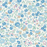 White cotton fabric with blue, tan, and pink floral pattern and green leaves