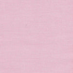 Pink micro gingham fabric with tiny woven check pattern in soft pastel pink