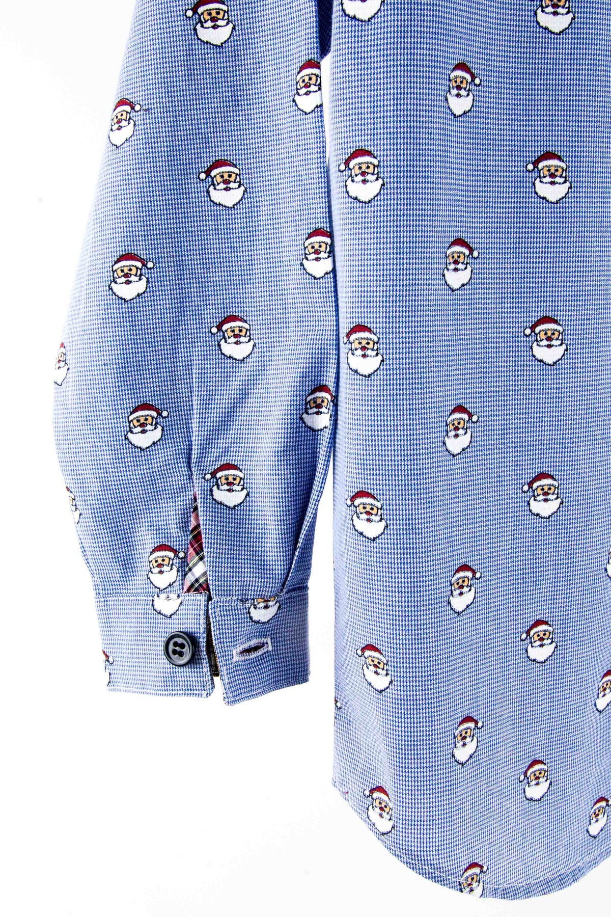 Blue micro check fabric with repeating Santa Claus face pattern, shown as a dress shirt